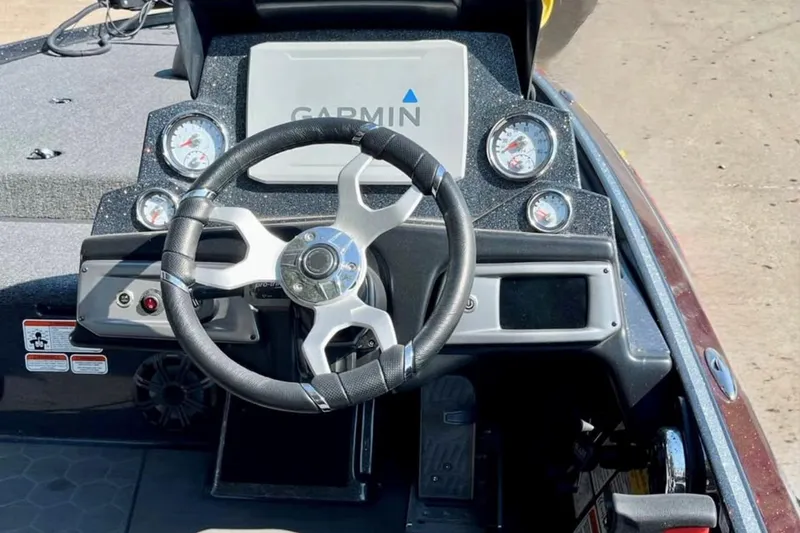 Slide: The Image of Steering wheel and dashboard of 2023 Nitro Z20 boat with Garmin display. - 17