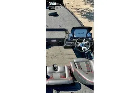 Slide: The Image of 2023 Nitro Z20 boat interior with Garmin display and dual seats. - 20