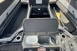 Slide: The Image of 2023 Nitro Z20 boat interior with storage compartments and cup holders. - 21