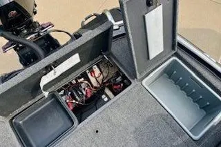Slide: The Image of 2023 Nitro Z20 boat storage compartments and battery area, open for inspection. - 24