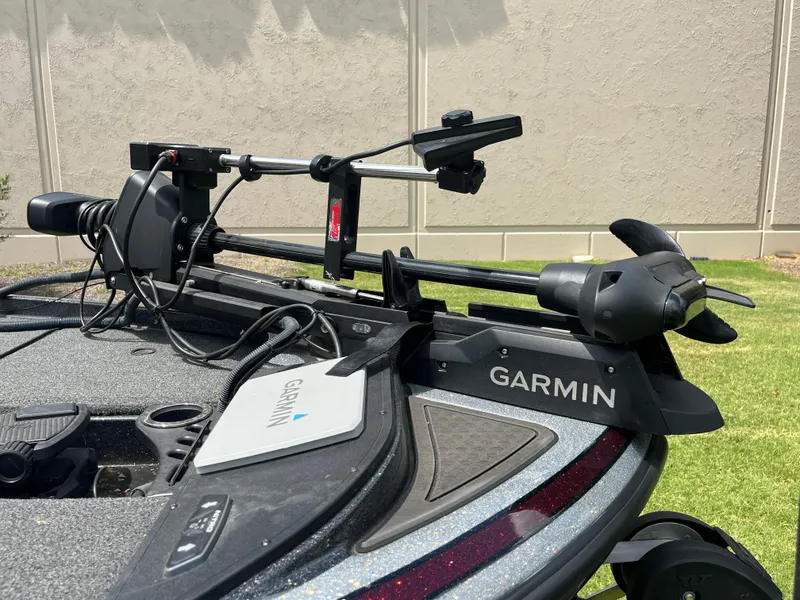 Slide: The Image of 2023 Nitro Z20 boat deck with fishing equipment and Garmin electronics. - 6