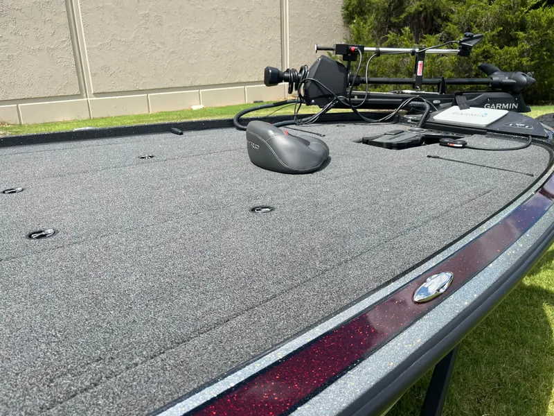 Slide: The Image of 2023 Nitro Z20 boat interior with Garmin display, sleek seats, and modern dashboard. - 7