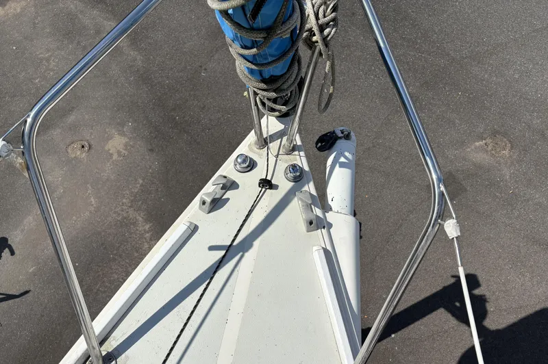 Slide: The Image of Bow of 1997 J Boats J/80 sailboat with rigging and stainless steel railings. - 8