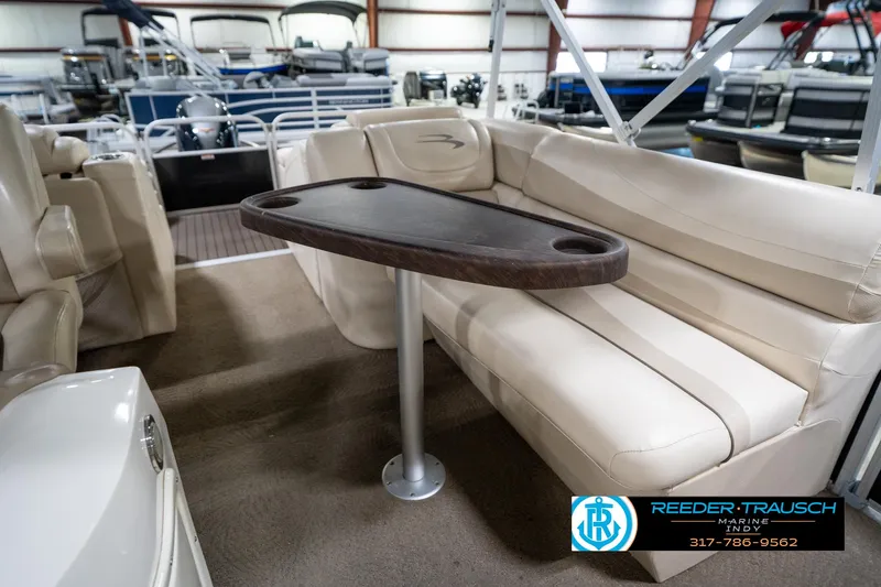 Slide: The Image of Steering wheel of 2014 Bennington 2275GCW boat, featuring sleek metallic design. - 34