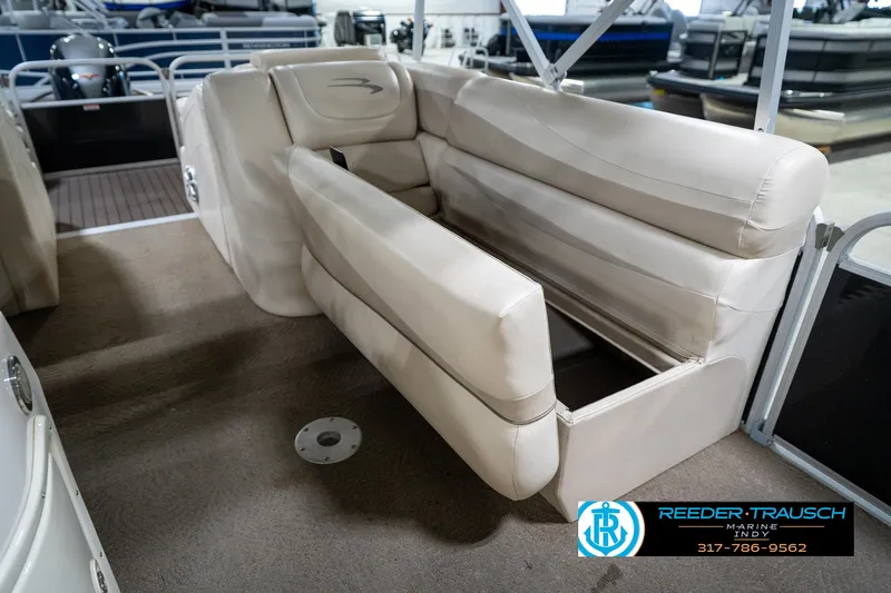 Slide: The Image of 2014 Bennington 2275GCW boat control panel with horn, AC, and navigation switches. - 36