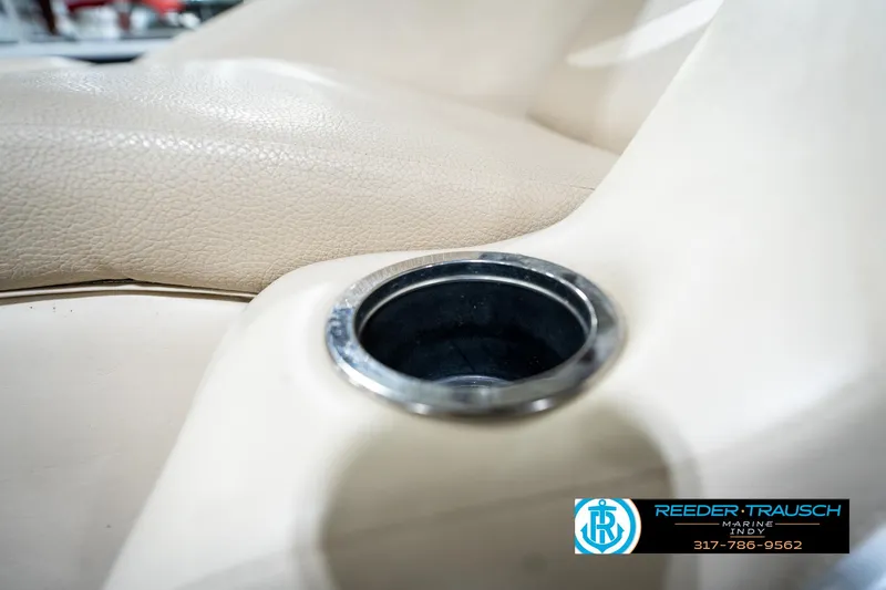 Slide: The Image of Close-up of 2014 Bennington 2275GCW boat throttle control in a showroom. - 40