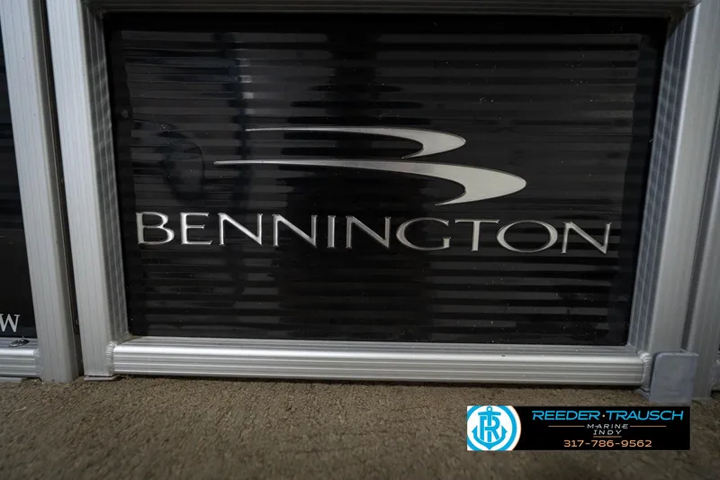 Slide: The Image of Propeller of a 2014 Bennington 2275GCW pontoon boat in a showroom. - 46