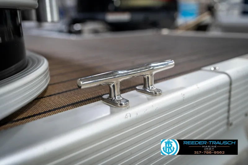 Slide: The Image of 2014 Bennington 2275GCW boat with G22 emblem, Reeder Trausch Marine logo. - 48