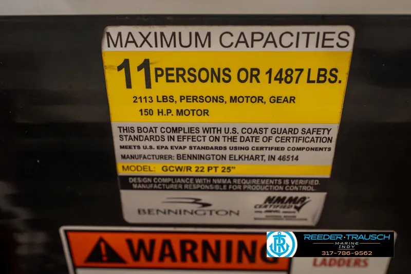 Slide: The Image of 2014 Bennington 2275GCW capacity label: 11 persons or 1487 lbs, 150 HP motor. - 50