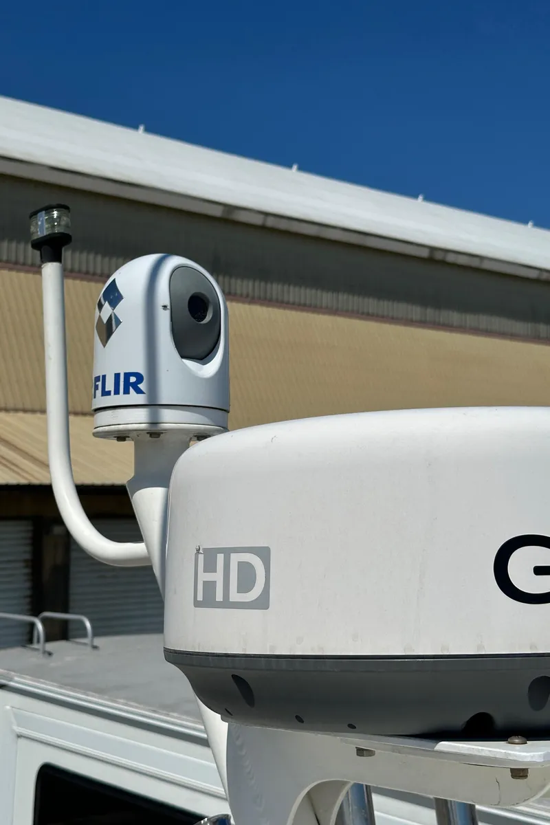 Slide: The Image of FLIR camera and HD radar on 2002 Pursuit 2860 Denali boat. - 46