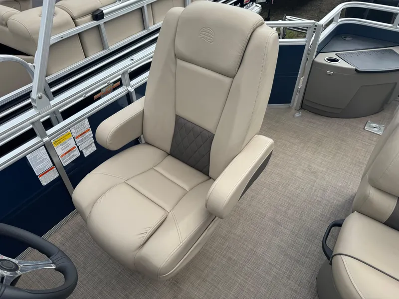 Slide: The Image of 2024 Sun Tracker Fishin' Barge 20 DLX captain's chair, beige upholstery, diamond-patterned insert. - 11