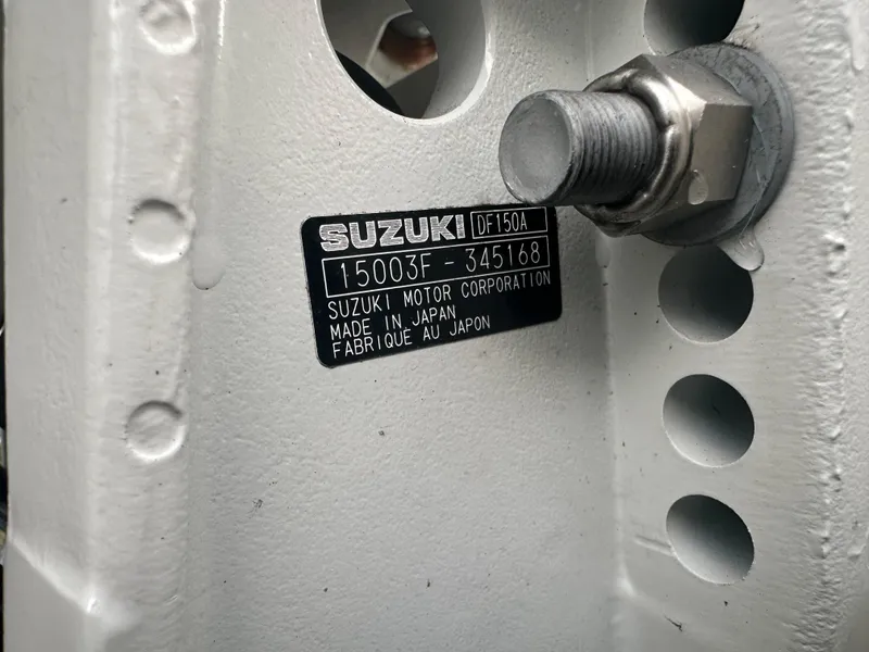 Slide: The Image of Label on Suzuki DF150A engine, Pioneer 202 Sportfish 2024 boat. Made in Japan. - 14