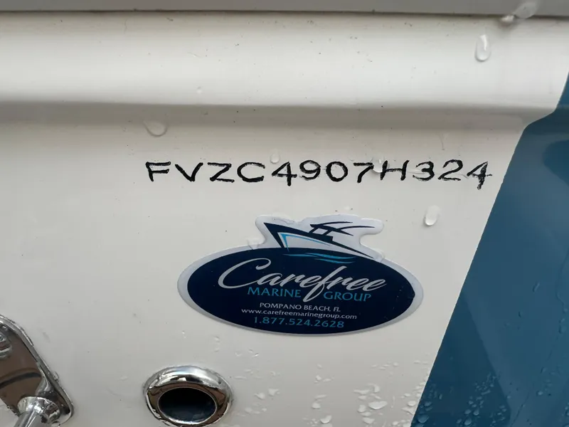 Slide: The Image of 2024 Pioneer 202 Sportfish boat with Carefree Marine Group sticker and serial number. - 15