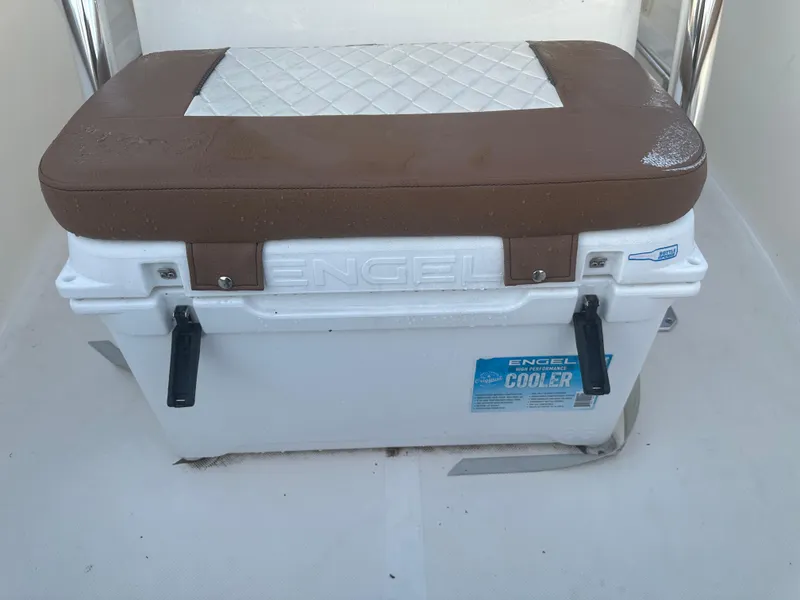 Slide: The Image of Engel cooler with cushioned seat on 2024 Pioneer 202 Sportfish boat. - 39