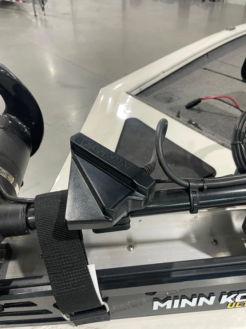 Slide: The Image of Garmin device on 2021 Bass Tracker 195 Pro Team XTE boat with Minn Kota motor. - 14