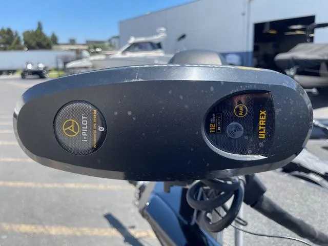 Slide: The Image of Close-up of a 2014 Lowe Stinger 18 HP boat's i-Pilot and Ultrex controls. - 8