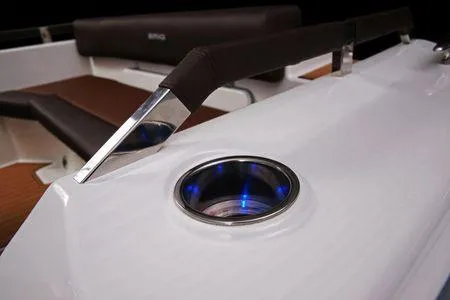 Slide: The Image of 2026 Brig Eagle 10 boat interior with sleek design and illuminated cup holder. - 16