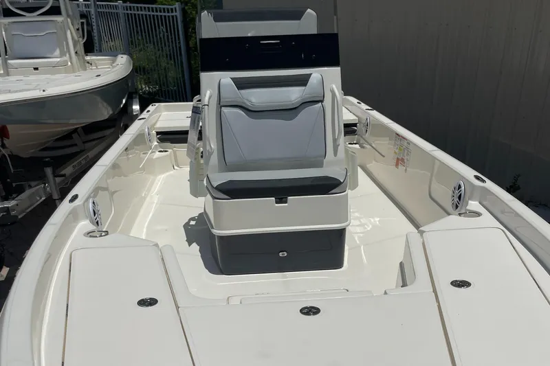 Slide: The Image of 2026 Skeeter SX 230 boat interior with seating and storage compartments. - 3
