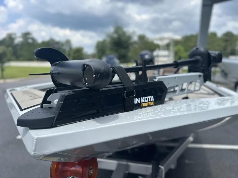 Slide: The Image of Avid 18 Vertex 2025 boat with Minn Kota Fortrex trolling motor on a trailer. - 15