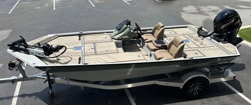 Slide: The Image of 2025 Avid 18 Vertex boat on trailer, featuring modern design and seating. - 2