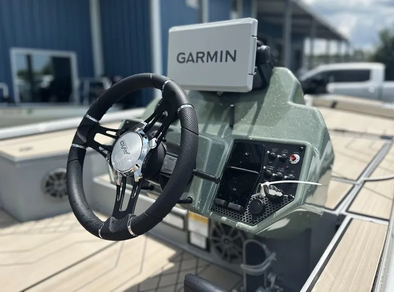 Slide: The Image of Steering console of 2025 Avid 18 Vertex boat with Garmin navigation system. - 20