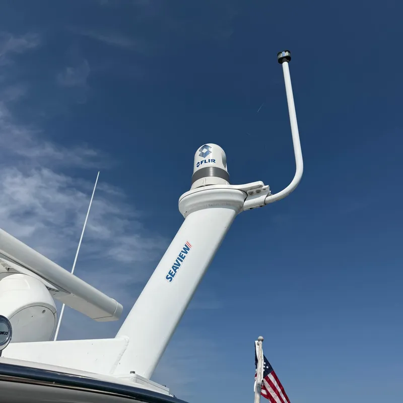 Slide: The Image of Radar and camera equipment on a 2015 Regal 46 Sport Coupe against a clear blue sky. - 12