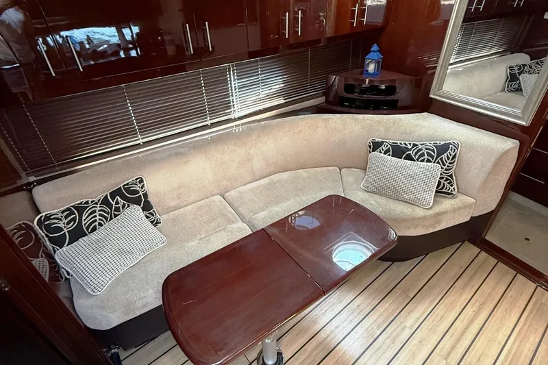 Slide: The Image of Luxurious interior of 2015 Regal 46 Sport Coupe with plush seating and elegant decor. - 18