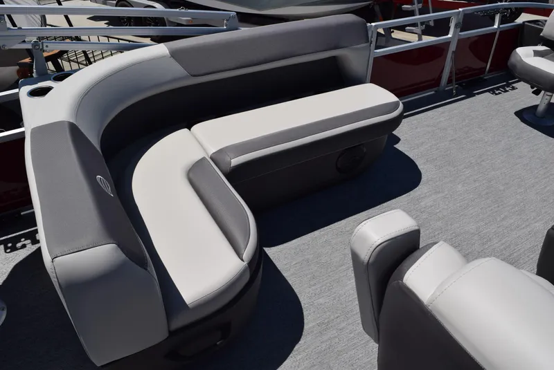 Slide: The Image of 2026 Sun Tracker Bass Buggy 18 DLX pontoon boat interior with gray seating. - 6