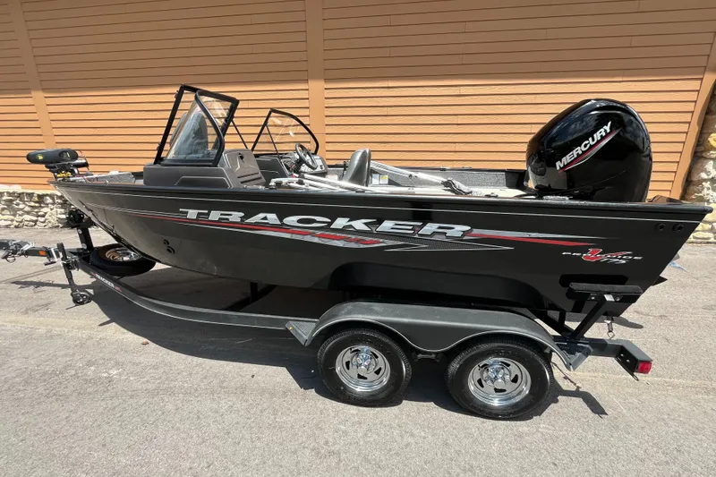 Slide: The Image of 2023 Tracker Pro Guide V-175 Combo boat on trailer, side view. - 3