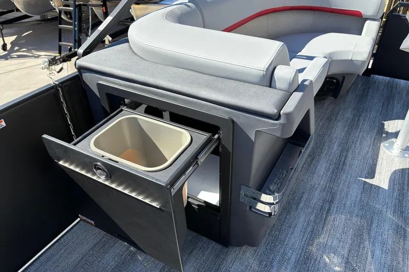 Slide: The Image of 2026 Bennington 22 MFB boat interior with built-in storage compartment and seating. - 13