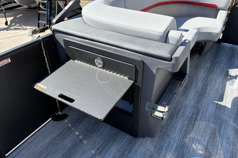 Slide: The Image of 2026 Bennington 22 MFB boat interior with fold-out table and seating. - 15