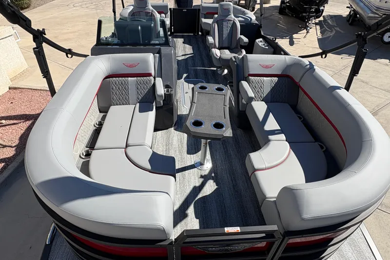 Slide: The Image of 2026 Bennington 22 MFB pontoon boat with luxurious seating and cup holders. - 6