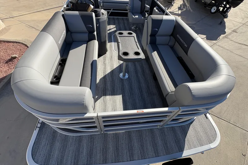 Slide: The Image of 2026 Bennington 21 SSB pontoon boat with spacious seating and modern design. - 5