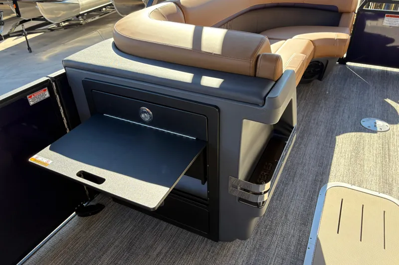 Slide: The Image of Open storage compartment on 2026 Bennington 24 MFB boat deck. - 10