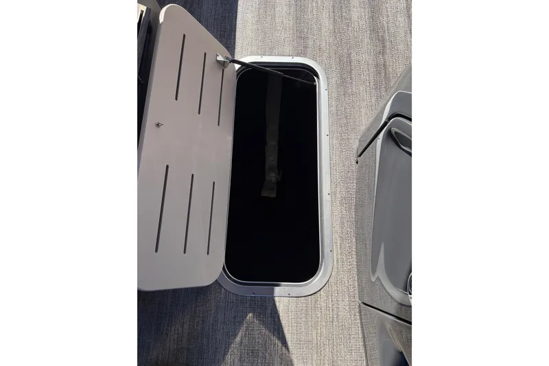 Slide: The Image of Interior of 2026 Bennington 24 MFB pontoon boat with luxurious seating and modern design. - 8