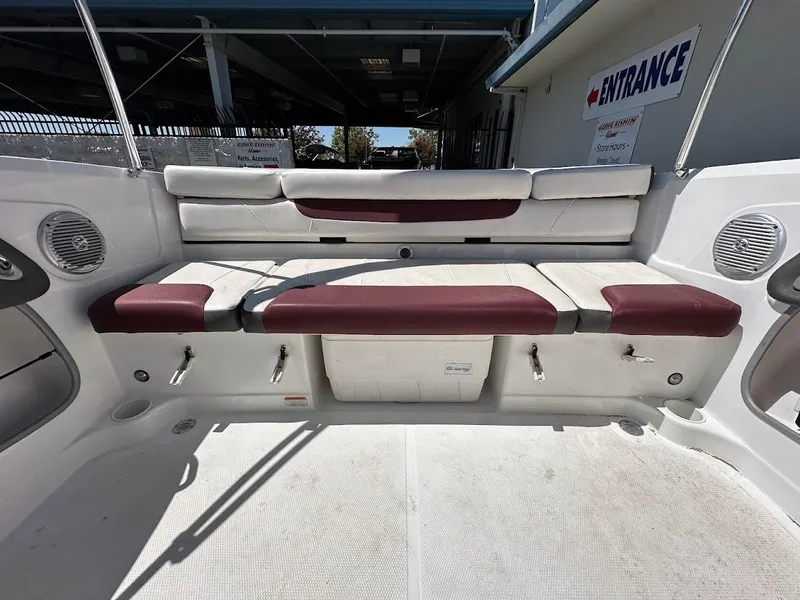 Slide: The Image of 2018 Tahoe 500 TF boat interior with cushioned seating and storage compartments. - 15