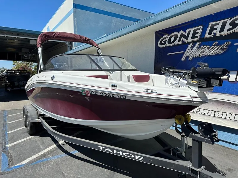 Slide: The Image of 2018 Tahoe 500 TF boat on trailer at marine dealership. - 5