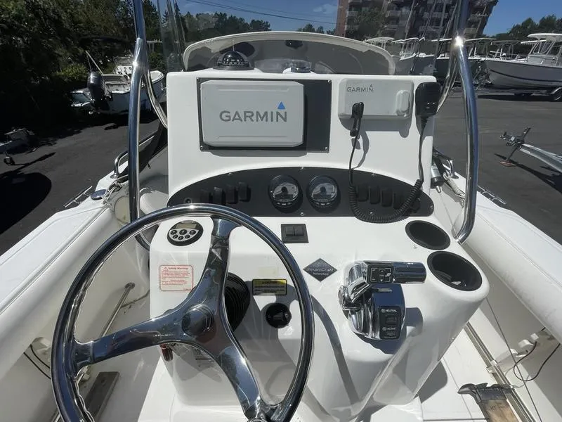 Slide: The Image of 2006 Boston Whaler 210 Outrage boat dashboard with Garmin navigation system. - 8