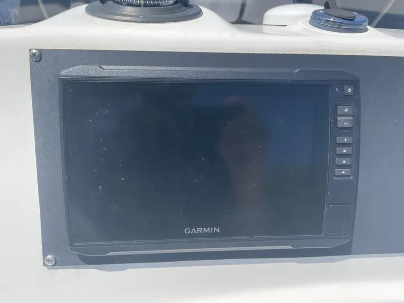 Slide: The Image of Garmin navigation display on 2006 Boston Whaler 210 Outrage boat dashboard. - 9
