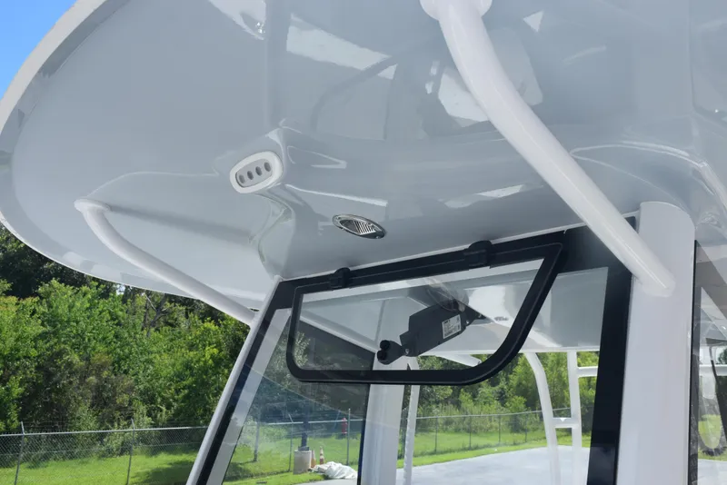 Slide: The Image of 2026 Sea Hunt Gamefish 28 Forward Seating boat canopy and windshield detail. - 14