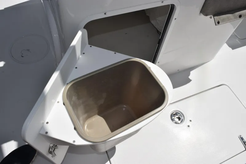Slide: The Image of Open storage compartment on 2026 Sea Hunt Gamefish 28 Forward Seating boat. - 19