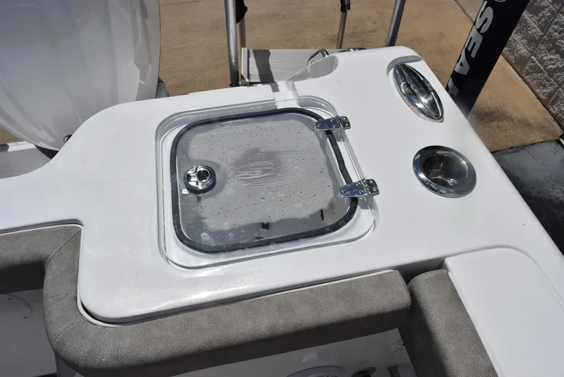 Slide: The Image of 2026 Sea Hunt Gamefish 28 Forward Seating boat detail with livewell and cup holders. - 21