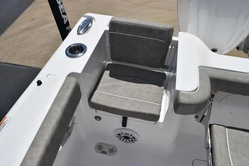 Slide: The Image of 2026 Sea Hunt Gamefish 28 Forward Seating with gray cushioned seats and cup holder. - 25