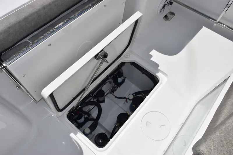 Slide: The Image of 2026 Sea Hunt Gamefish 28 Forward Seating boat storage compartment with open hatch. - 27