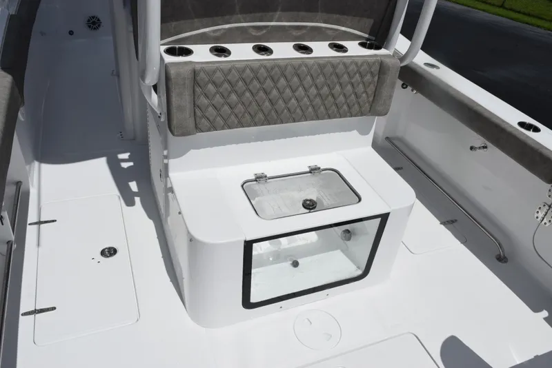 Slide: The Image of 2026 Sea Hunt Gamefish 28 Forward Seating boat interior with storage and seating. - 7