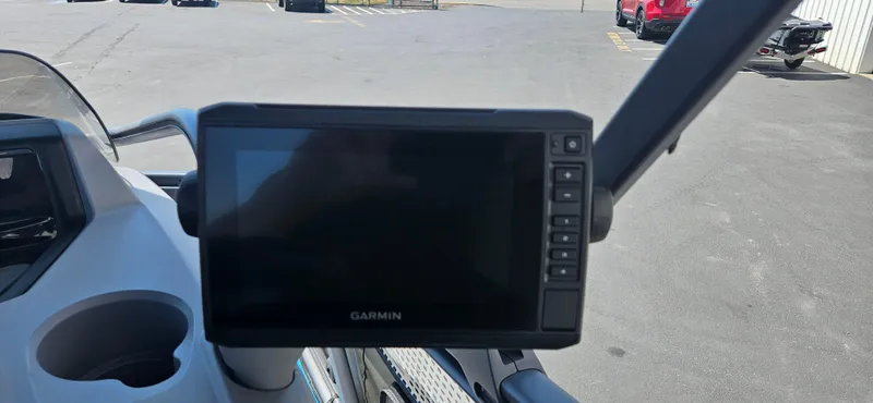 Slide: The Image of Garmin display on 2023 Sea-Doo Switch Sport Compact, parked in a lot. - 11