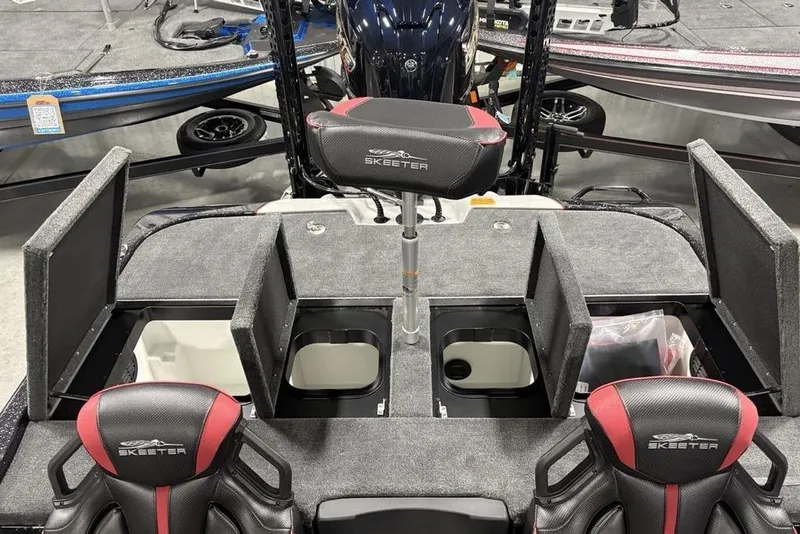 Slide: The Image of 2026 Skeeter ZXE20 boat interior with storage compartments and seating. - 22