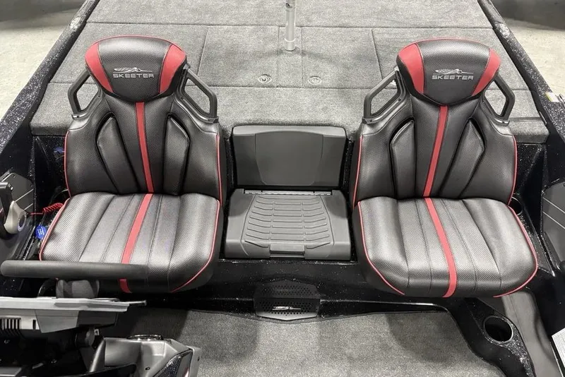 Slide: The Image of 2026 Skeeter ZXE20 boat seats with black and red design, featuring ergonomic support. - 26