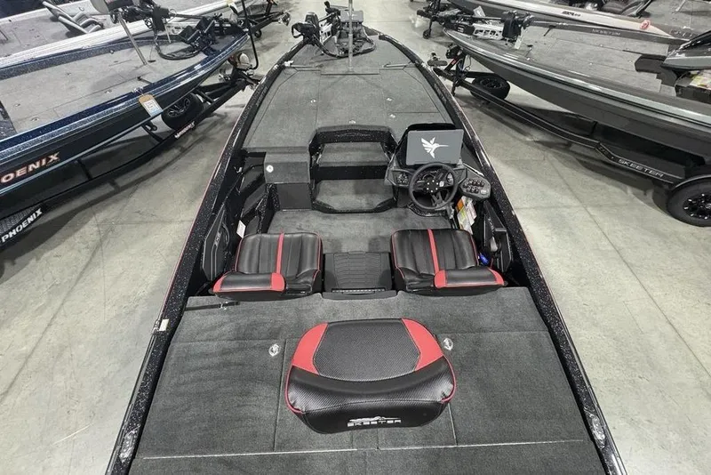 Slide: The Image of 2026 Skeeter ZXE20 fishing boat interior with dual seats and steering console. - 31