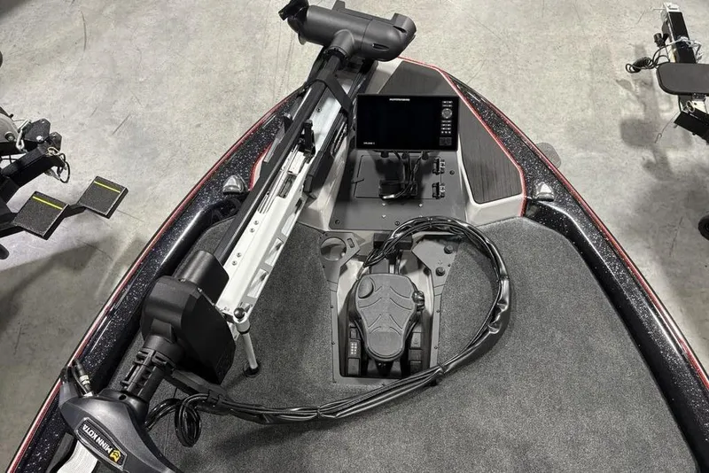 Slide: The Image of 2026 Skeeter ZXE20 boat deck with trolling motor and electronic display. - 7